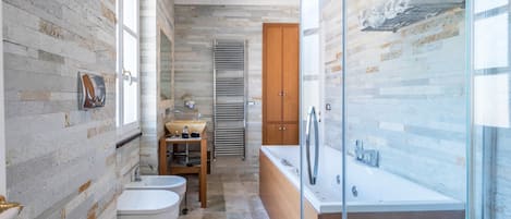 Bathtub, hair dryer, towels