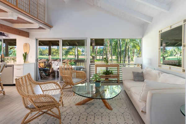 Living room with views over the golf course to foliage and mountains. See Lanai.