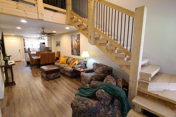 View of Living Room, and Stairs to Loft Area