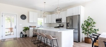 West End Escape |Screened-In Porch |Private Balconies |Lake View |Walking Distance to Public Beach