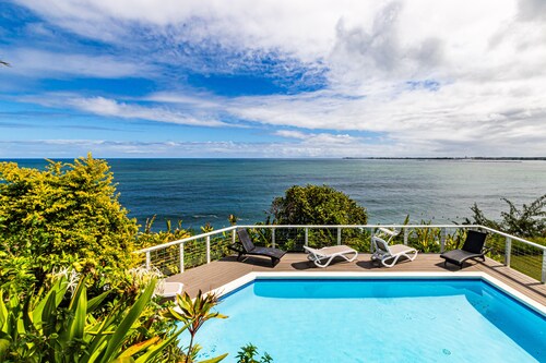 Oceanfront in Hilo Hale Kai Suites- Pele Suite - King Bed, Living Room, Bath