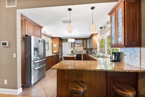 Fridge, microwave, oven, stovetop - Tropical Resort Style Retreat w/ Pool House 4BR, 3 Bath (Stuart)