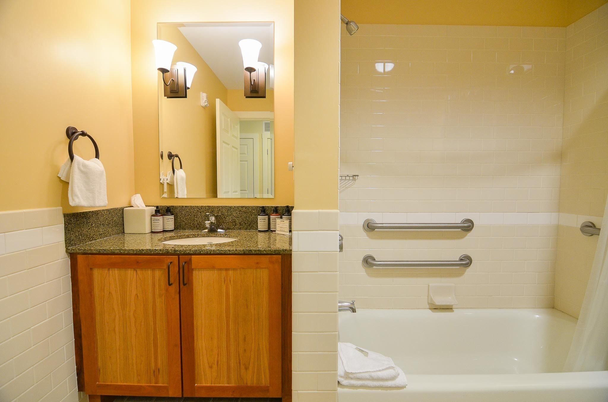 Combined shower/bathtub, hair dryer, towels, soap