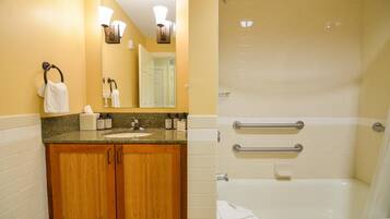 Combined shower/bathtub, hair dryer, towels, soap