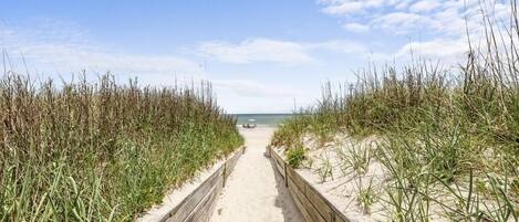 On the beach, sun-loungers