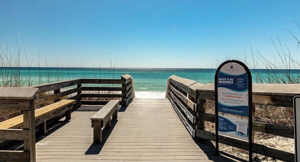 Walk along the boardwalk to the ocean, where benches offer a place to rest and take in the view.
