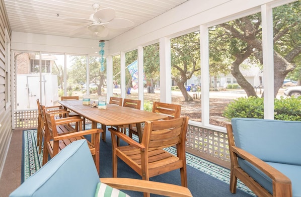 Dining out in the spacious screened in porch