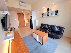 Deluxe Apartment | Living area