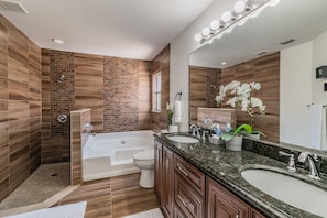 Combined shower/tub, hair dryer, towels, soap