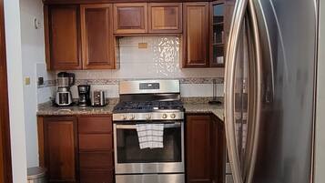 Microwave, coffee/tea maker, cookware/dishes/utensils