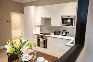 Superior Apartment, 2 Bedrooms | Private kitchen | Full-sized fridge, microwave, oven, stovetop