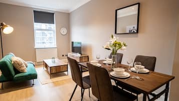 Superior Apartment, 2 Bedrooms | Living area | 40-inch Smart TV with cable channels, TV