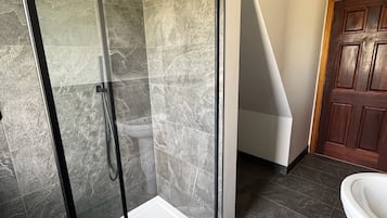 Bathtub, hair dryer, towels, soap