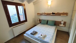 2 habitaciones, caja de seguridad en la habitación y ropa de cama 