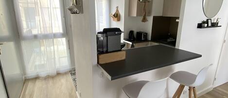 Fridge, microwave, stovetop, coffee/tea maker