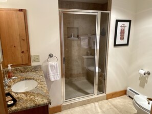 Combined shower/tub, hair dryer, towels, soap