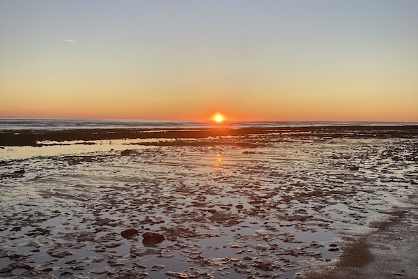 Beach nearby, sun loungers
