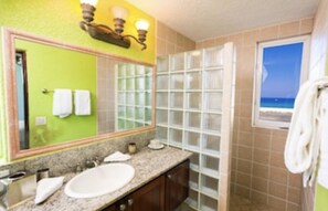 Shower, hair dryer, towels, toilet paper