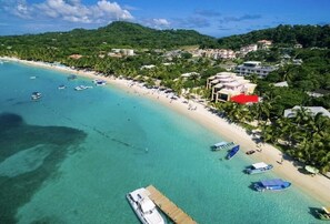 On the beach, sun-loungers