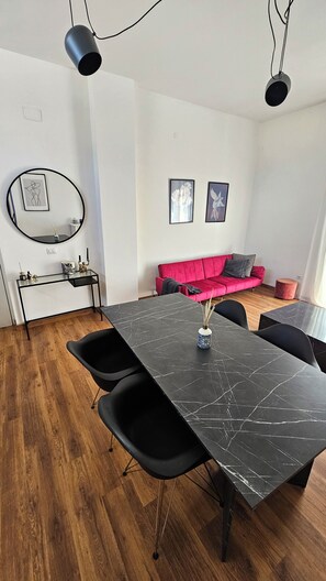 Deluxe Apartment, City View | Living area | 40-inch flat-screen TV with digital channels, Netflix