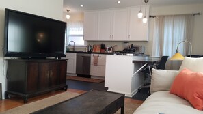 Smart TV, fireplace, DVD player, books