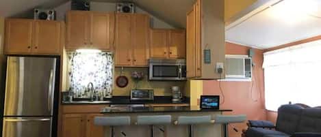 Fridge, microwave, coffee/tea maker, toaster