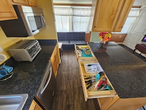 Fridge, microwave, coffee/tea maker, toaster