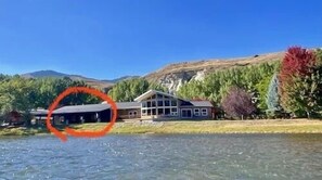 850 sq ft guest house circled in red. Right on the river. Huge patio!