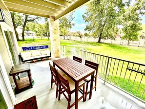 Outdoor dining - Two Side-by-Side Riverfront Condos, Walk to Gruene Hall - 6BR (New Braunfels)