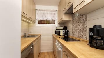 Fridge, microwave, cookware/dishes/utensils