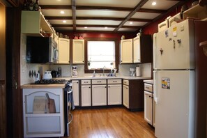 Fridge, microwave, oven, stovetop - Rustic Country farmhouse on 2 acres close to several lakes. (North Webster)