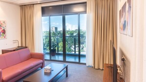 Chambre Luxe avec lits jumeaux | Salle de séjour