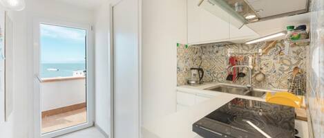 Apartment, 1 Bedroom, Smoking, Terrace | Private kitchen | Fridge, stovetop, electric kettle, cookware/dishes/utensils