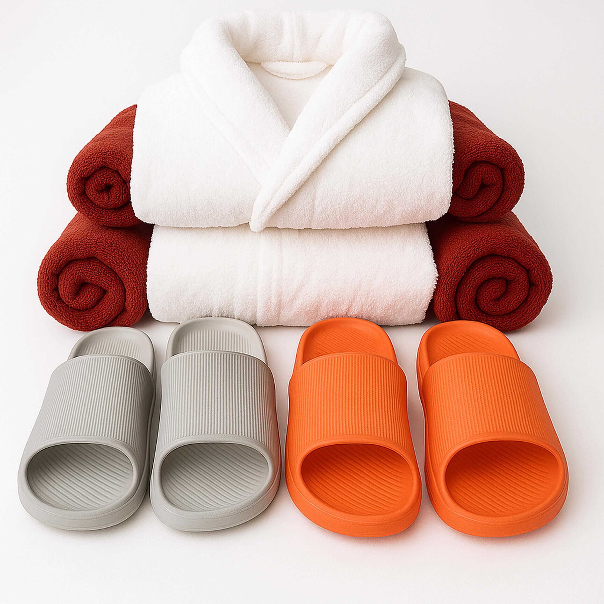 A stack of towels and slippers.