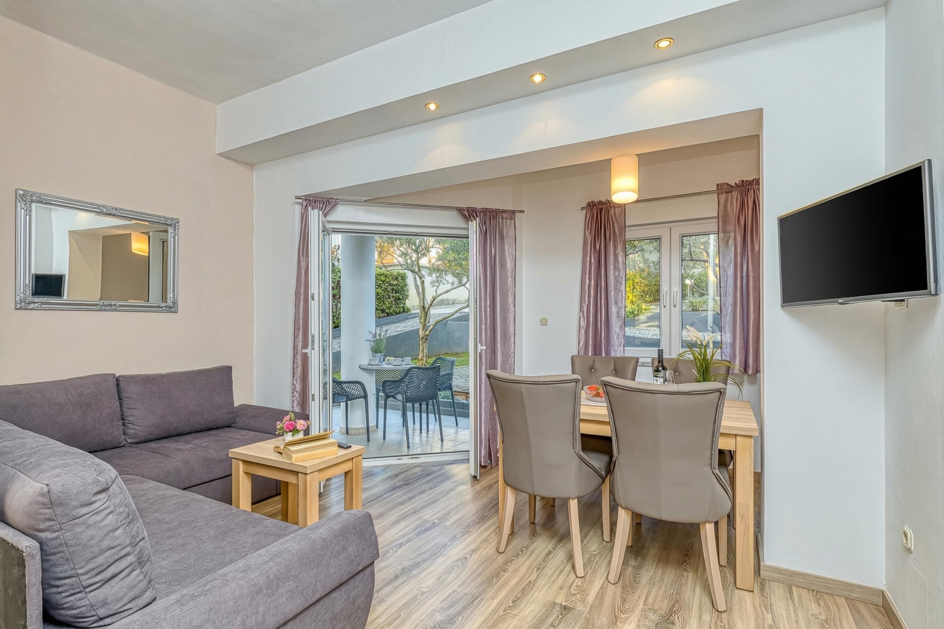 Family Apartment, Multiple Bedrooms, Mountainside (Apartment Matea 220m from the beach) | Living area | 21-inch flat-screen TV with digital channels, TV