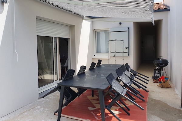 Terrasse avec store banne