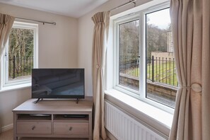 Rumah | Area keluarga | Televisi layar datar 32-inci dengan saluran TV digital dan TV