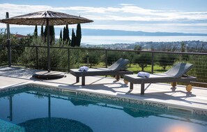 Outdoor pool, a heated pool - Nice Home in Kucine with WiFi, 4 Bedrooms & Hot Tub (Solin)