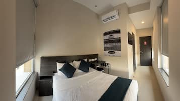 Standard Room, 1 Queen Bed | Down comforters, in-room safe, soundproofing, free WiFi