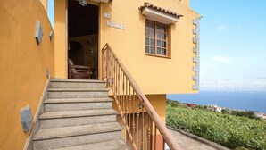 A staircase leading to a building with a sign reading 'LA CHOCITA.' - Vacation Home Casa La Chocita with Sea View, Mountain View (Los Realejos)