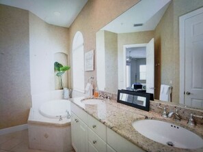 Bathtub, jetted bath, hair dryer, towels