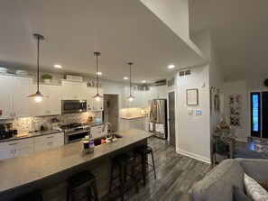 Microwave, dishwasher, coffee/tea maker, cookware/dishes/utensils