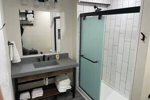 Combined shower/bathtub