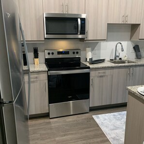 Fridge, microwave, oven, stovetop - Entire apartment huge STUDIO APT available now!  (Tucker)