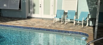 Tropical pool home with big backyard, close to beach, high and dry, never floods