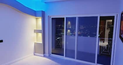 Upscale luxurious apartment with a superb view.