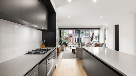 Fridge, microwave, oven, stovetop. Anchorage Villa | Chic, Pet Friendly by Marina