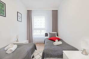 2 habitaciones, tabla de planchar con plancha, wifi y ropa de cama 