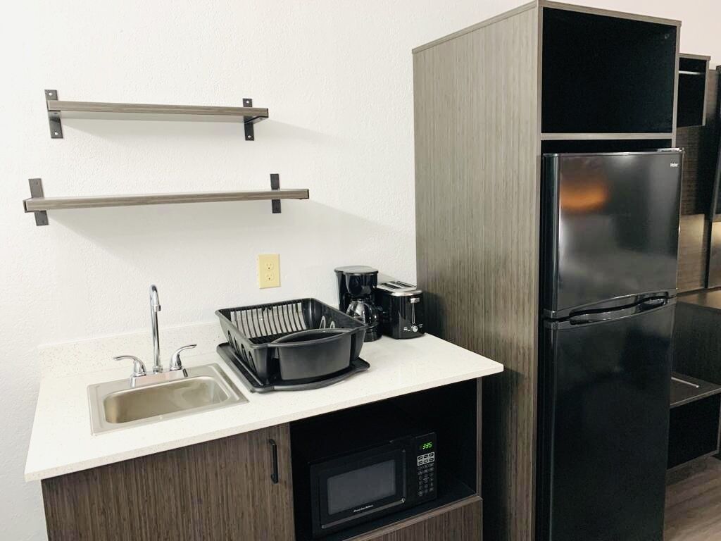 full-sized fridge, microwave, coffee/tea maker, toaster