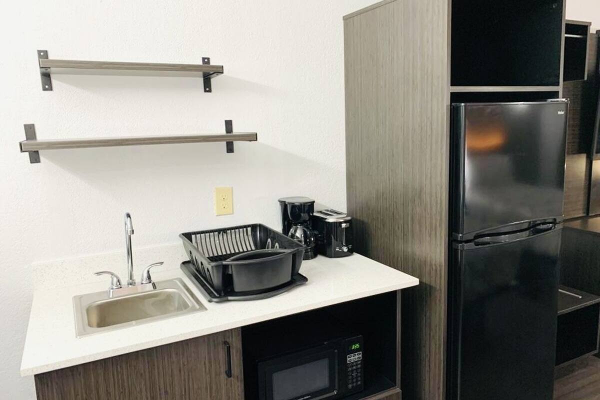 full-sized fridge, microwave, coffee/tea maker, toaster